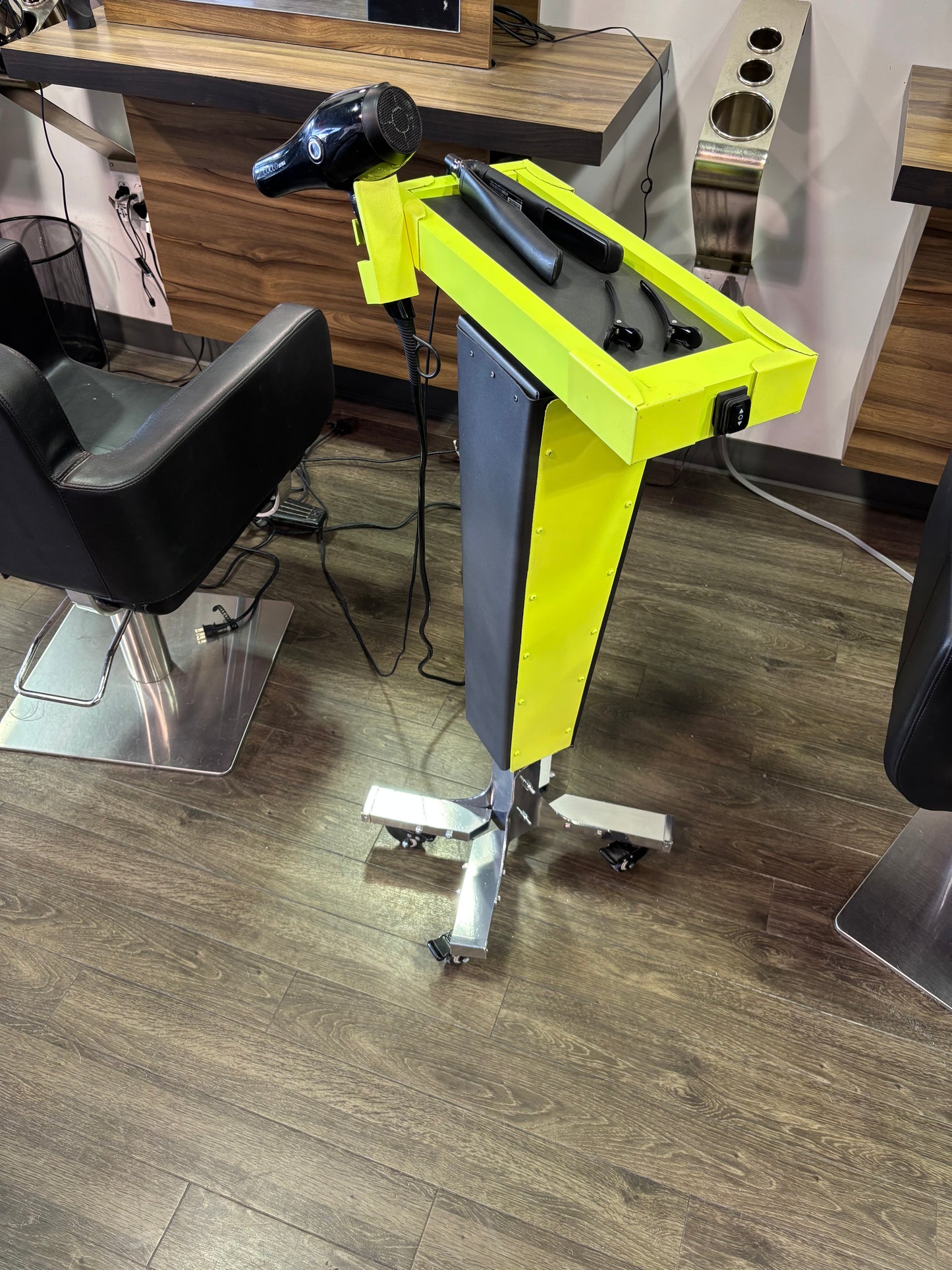 Motorized trolley with blow dryer holder