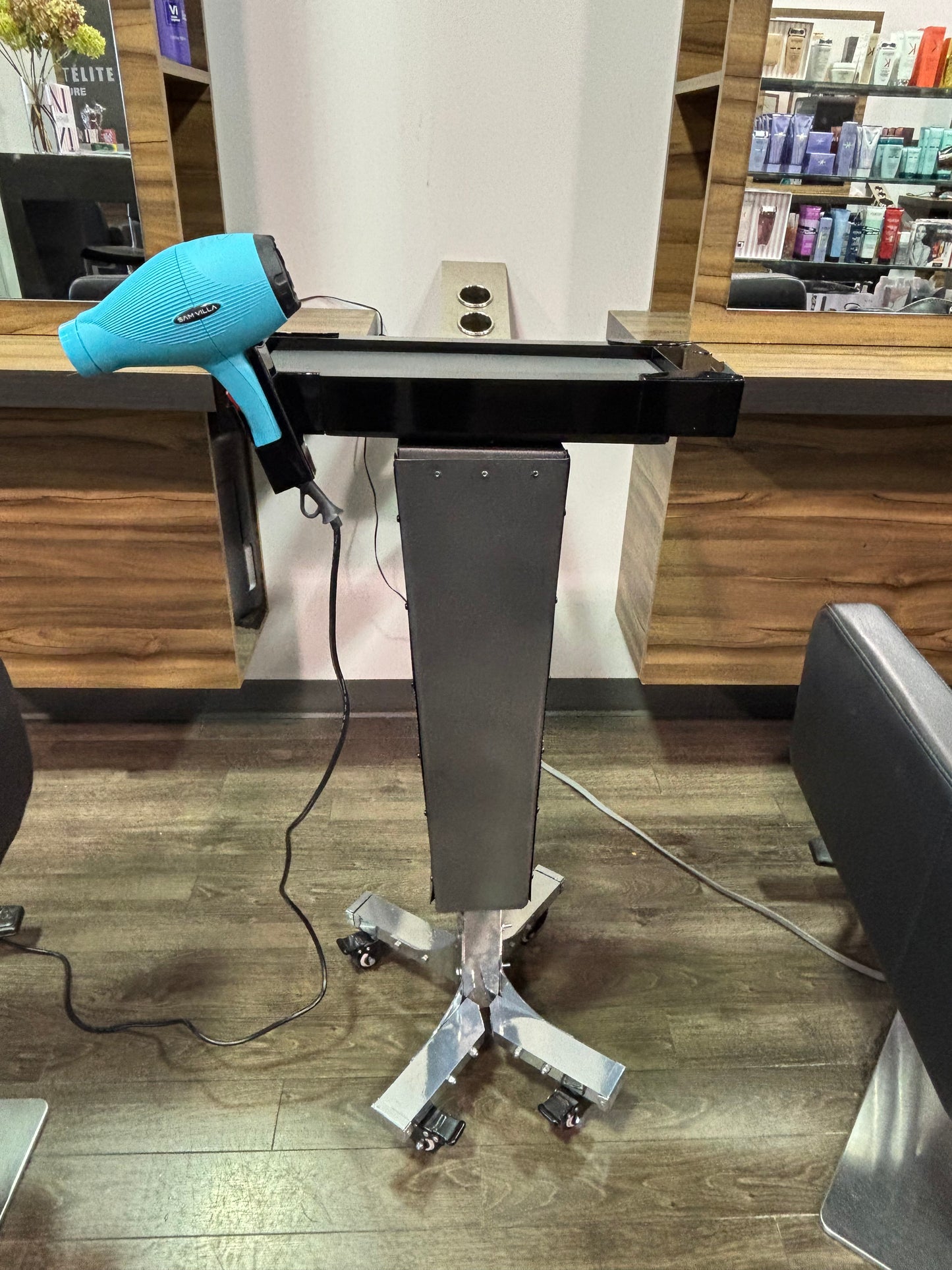 Motorized trolley with blow dryer holder
