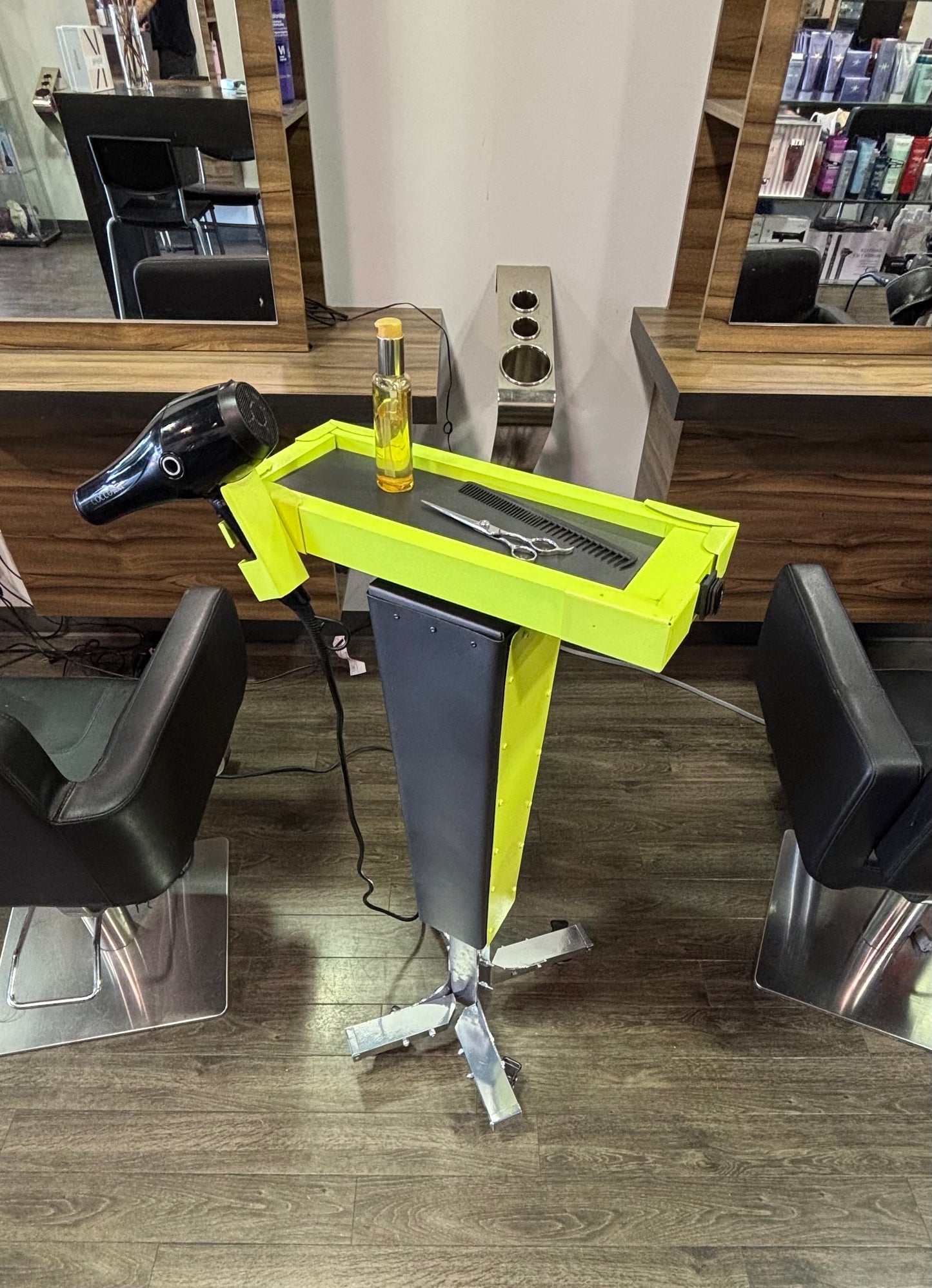 Motorized trolley with blow dryer holder