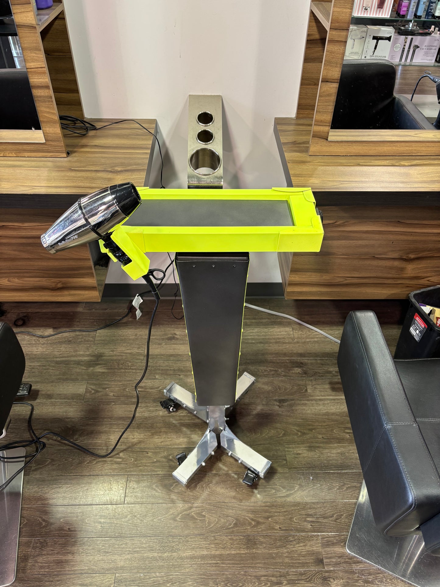 Motorized trolley with blow dryer holder